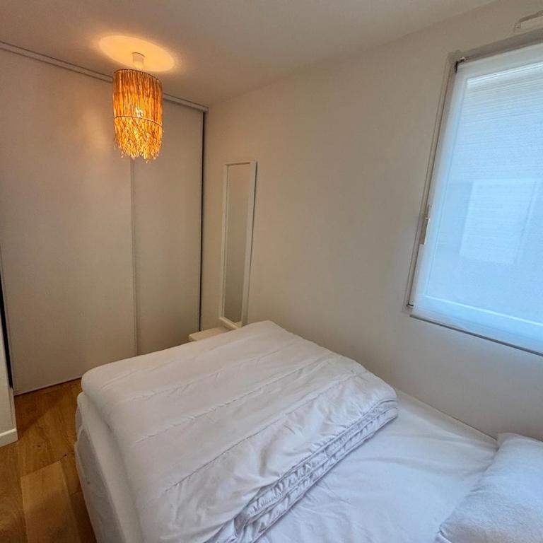 T2 en rez-de-jardin avec terrasse privative, résidence avec piscine et tennis - Apartamento de 1 dormitorio - 9