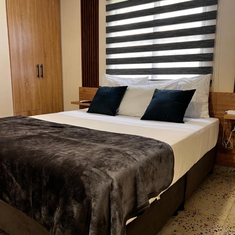 Magiko Suites - Habitación Triple Deluxe - 22