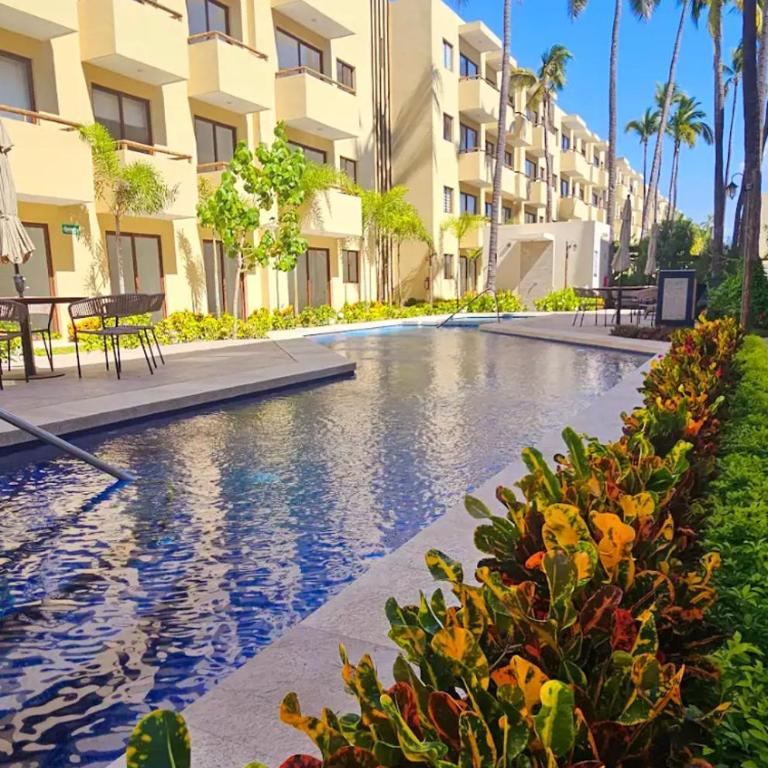 Nuevo departamento con acceso frente a la playa, jacuzzi y alberca climatizada - One-Bedroom Apartment - 10
