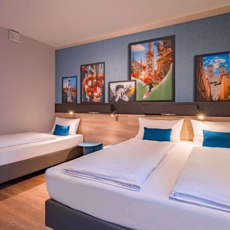Ramada Encore by Wyndham Munich Messe - Deluxe Dreibettzimmer mit 3 Einzelbetten - 2