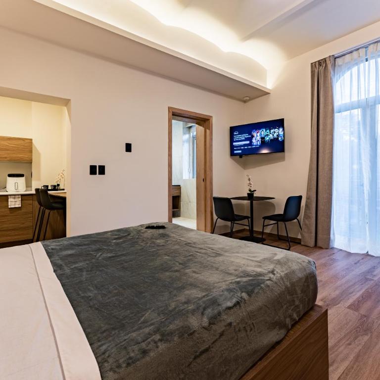 Suites Monterrey by Escajal Rooms - Habitación Deluxe - 1 cama grande - 1