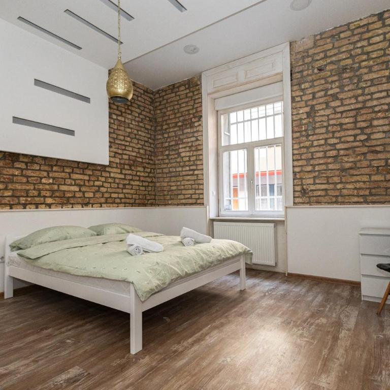 Spacious & Minimalistic Apartment in Downtown - Three-Bedroom Apartment - 12
