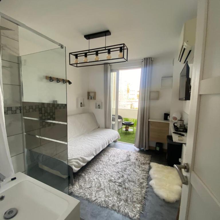 Logement dans une résidence de bien être avec jacuzzi et piscine chauffée - Studio avec Terrasse - 18