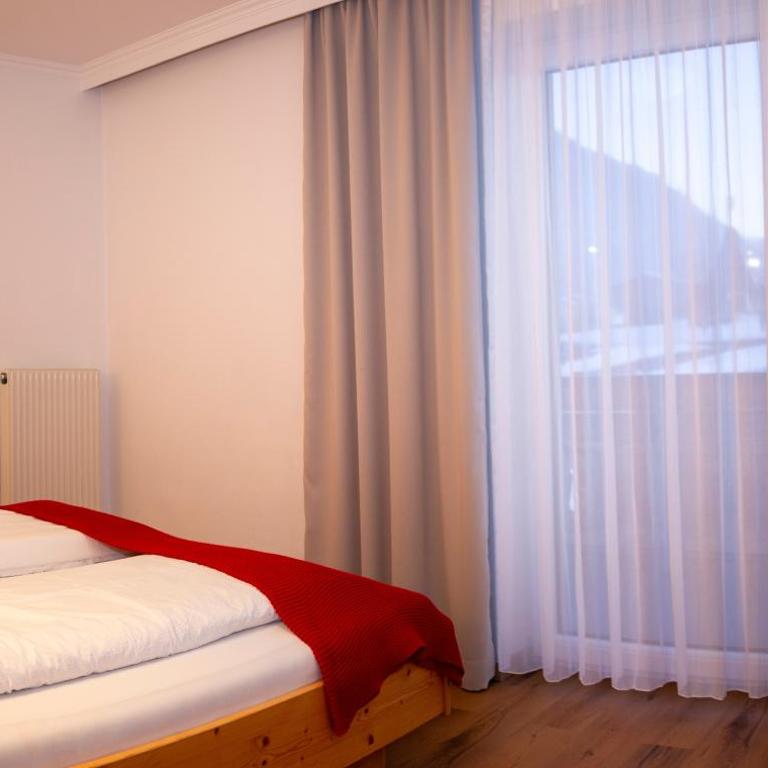 Appartement-Gästehaus Ursula - Großes Apartment mit 2 Schlafzimmern und einem Balkon - 9