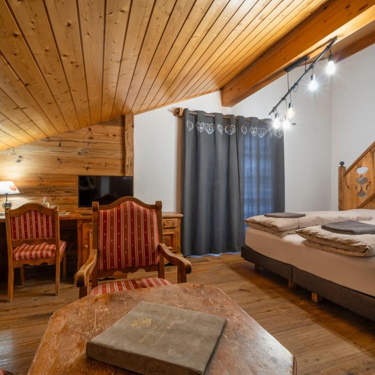 Hôtel Le Grand Chalet - Junior Familiensuite im Chalet mit Balkon und Bergblick - 1