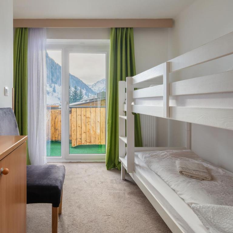 Hotel Sonnhof Rauris - Familiensuite mit 2 Schlafzimmern - 4
