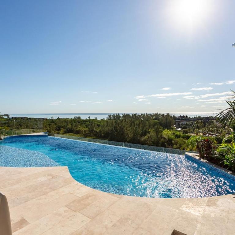 Nature view steps from the Caribbean Sea - One-Bedroom Apartment - 55