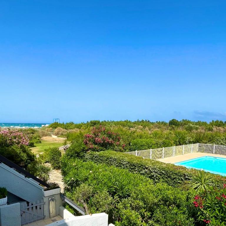 Appartement entre la lagune et la mer avec piscine, direct plage, vue partielle mer - One-Bedroom Apartment - 1