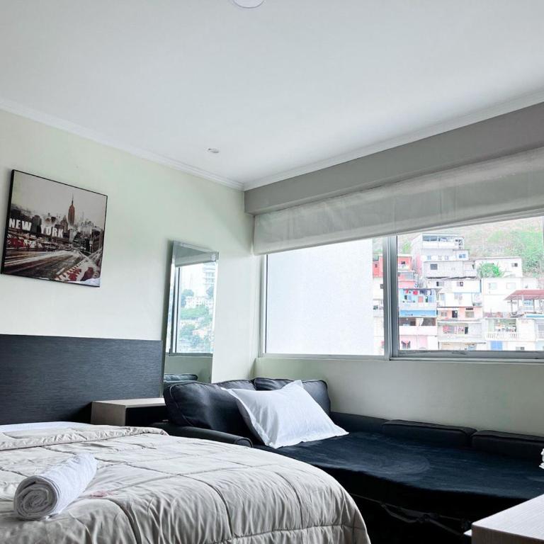 Suite con Jacuzzi y GYM en Puerto Santa Ana - Suite with City View - 15