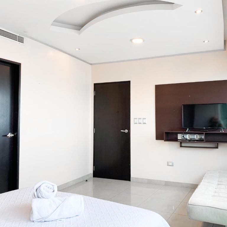 Departamento con Piscina, Jacuzzi y GYM - Two-Bedroom Apartment with River View - 14