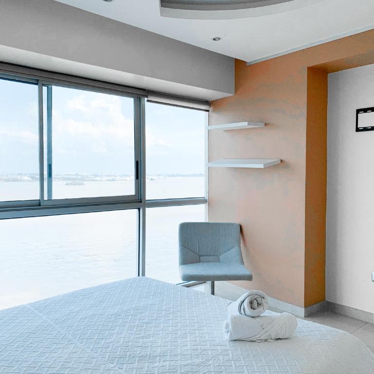 Departamento con Piscina, Jacuzzi y GYM - Two-Bedroom Apartment with River View - 19