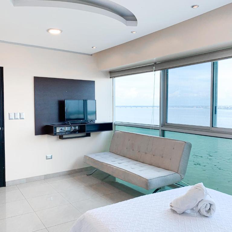 Departamento con Piscina, Jacuzzi y GYM - Two-Bedroom Apartment with River View - 15