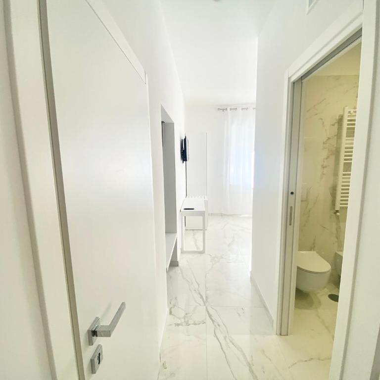 IL VIAGGIATORE RELAIS SUL MARE - Camera Quadrupla Comfort - 1
