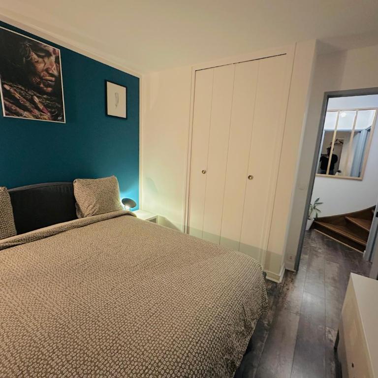 Cosy Duplex avec Parking à Paris 19 by immo kit bnb - Appartement 2 Chambres - 32