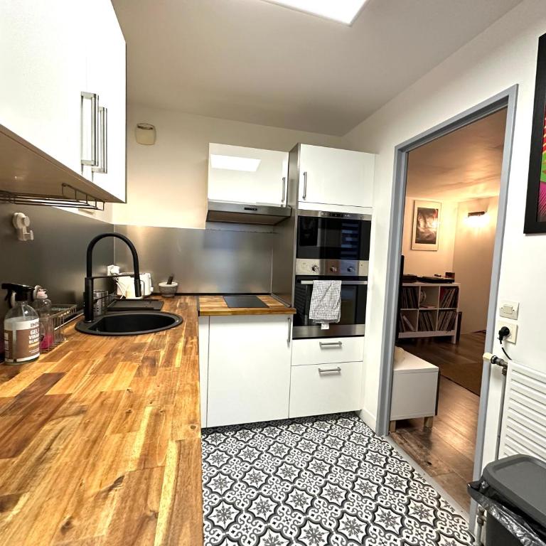 Cosy Duplex avec Parking à Paris 19 by immo kit bnb - Appartement 2 Chambres - 24