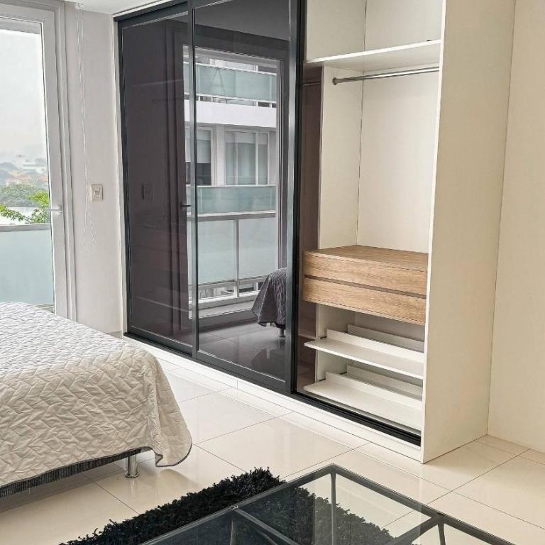 Loft sobrio, rooftop panorámico y piscina infinita - One-Bedroom Apartment - 15