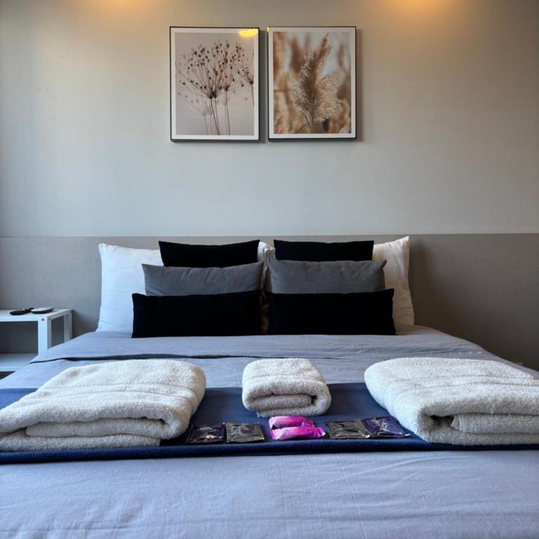 Av Suites - Habitación con cama grande - 7