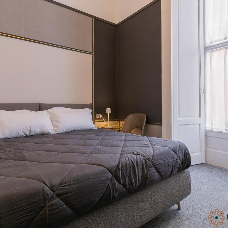 Palazzo Piccinni 97 by Apulia Accommodation - Camera King - 7