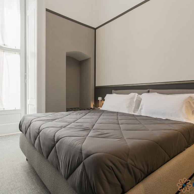 Palazzo Piccinni 97 by Apulia Accommodation - Suite Familiare Deluxe - 1