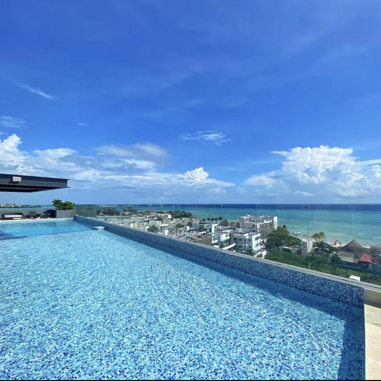Luxury 1BR condo-Amazing Oceanviews Prime location close to beach - One-Bedroom Apartment with Sea View and Terrace - 14