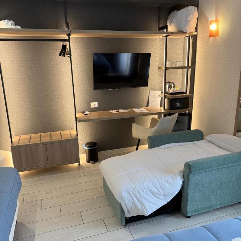 Castrichella Smart Boutique Hotel Rome Airport - Camera Tripla Deluxe - 8