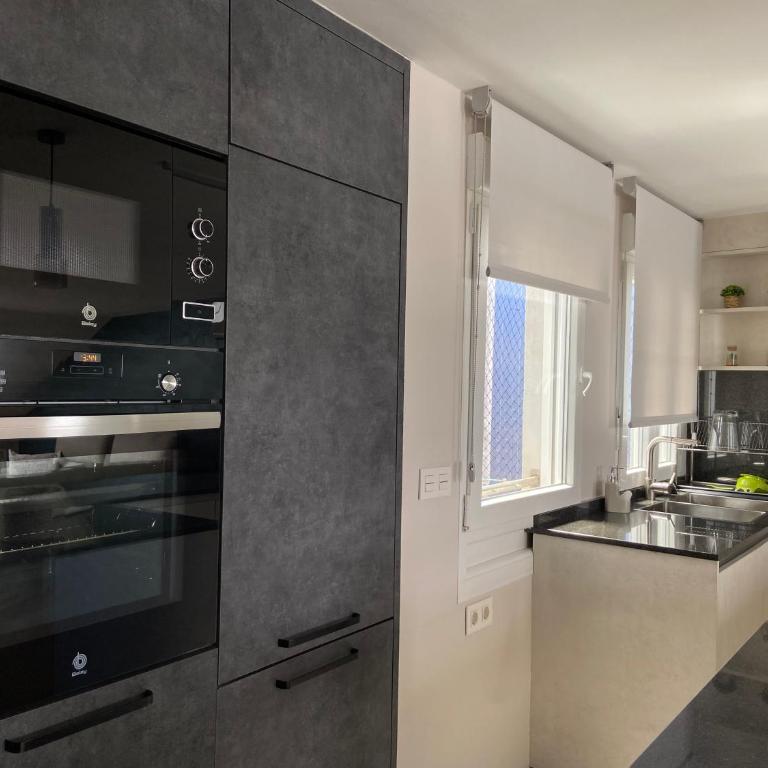 Ático 22 - céntrico, aire acondicionado y parking - Two-Bedroom Apartment - 38