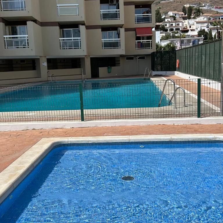 Vista Marina con piscina todo el año - Estudio - 18
