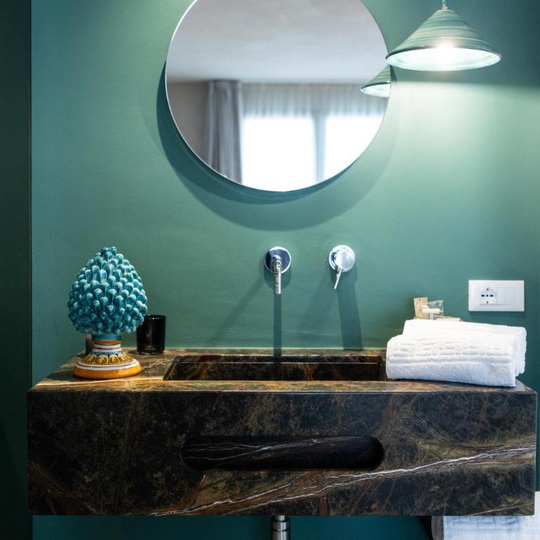 Oikos Rooms - Chambre Deluxe - 10