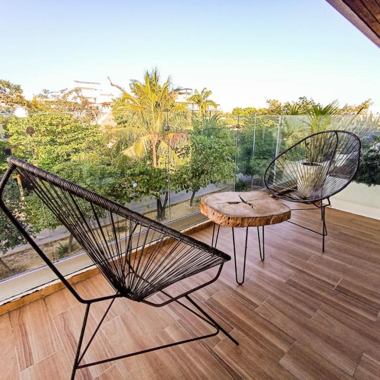KUMARU - Wide Studio with Sunny Balcony Pool Gym Steps 2 Beach - Apartment - 6