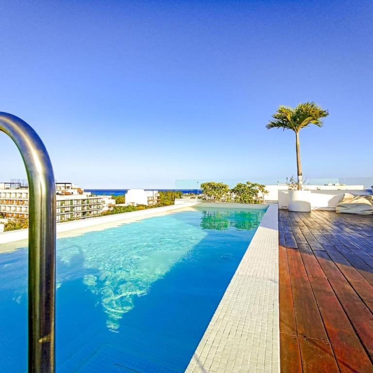KUMARU - Wide Studio with Sunny Balcony Pool Gym Steps 2 Beach - Apartment - 19