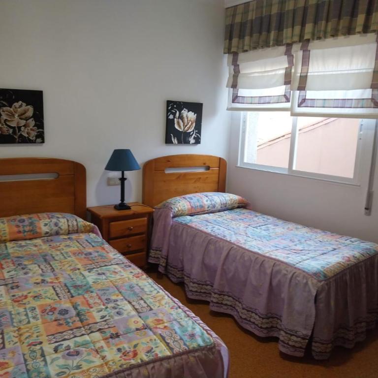 Apartamentos Barral - Apartamento de 3 dormitorios con vistas al puerto - 10
