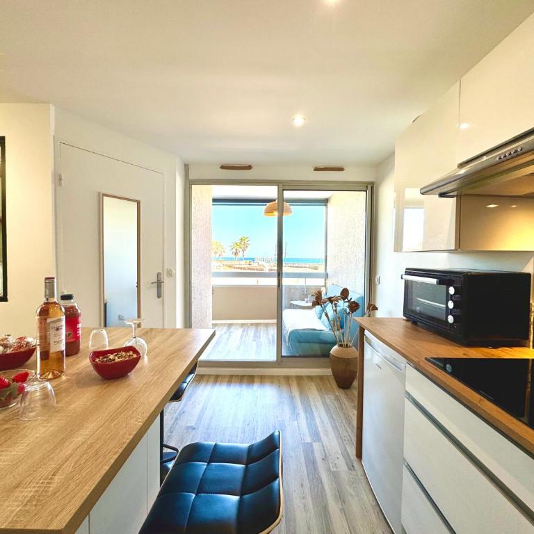 Le Maëva - T2- Front de mer- Clim - Parking - Wifi- SudSéjourConciergerie - Apartamento de 1 dormitorio con vistas al mar - 10