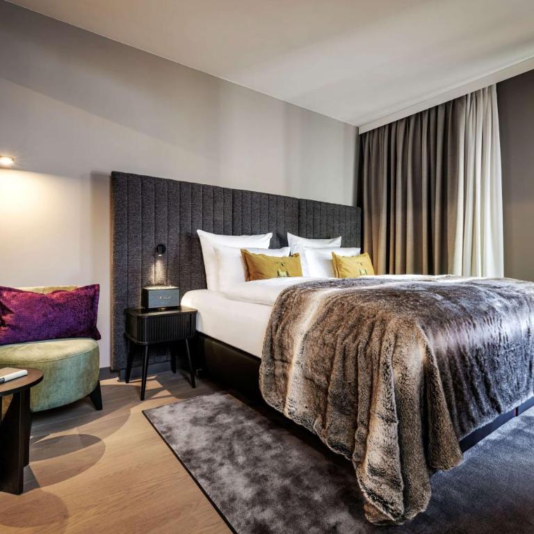 Grand Tirolia Kitzbühel - Member of Hommage Luxury Hotels Collection - Junior Suite mit Kingsize-Bett und Alpenblick - 1