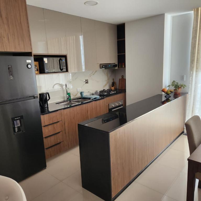 Departamento de Lujo - Habitación Familiar con terraza - 2