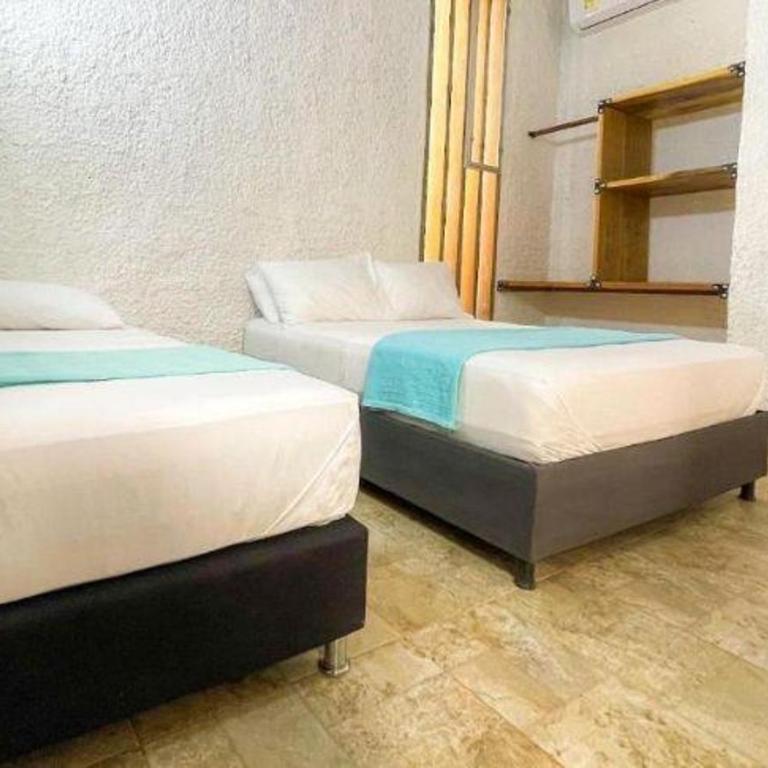 Hotel Palmas del Río - Habitación Triple Deluxe - 3
