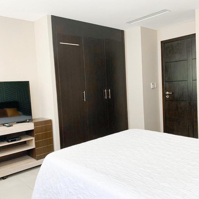 Depa familiar en piso alto vistas espectaculares - Two-Bedroom Apartment with City View - 11