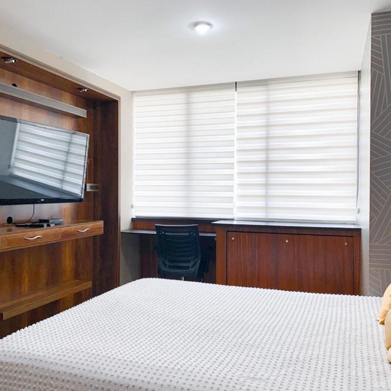 Depa familiar en piso alto vistas espectaculares - Two-Bedroom Apartment with City View - 25