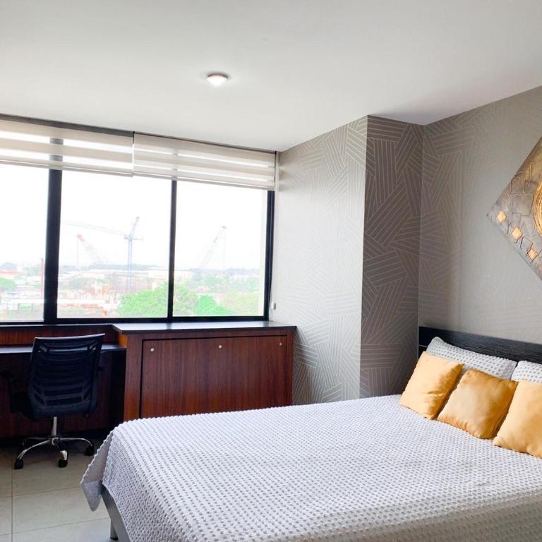 Depa familiar en piso alto vistas espectaculares - Two-Bedroom Apartment with City View - 24