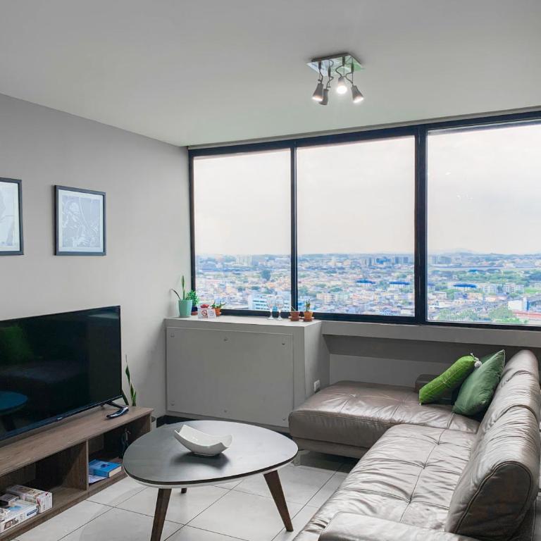 Suite vista al rio desde piso alto parking - Suite with City View - 16
