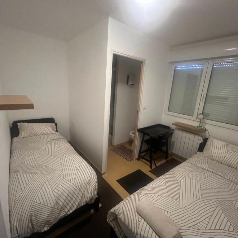 Le Manteau Bleu - Chambre Quadruple en Duplex - 7