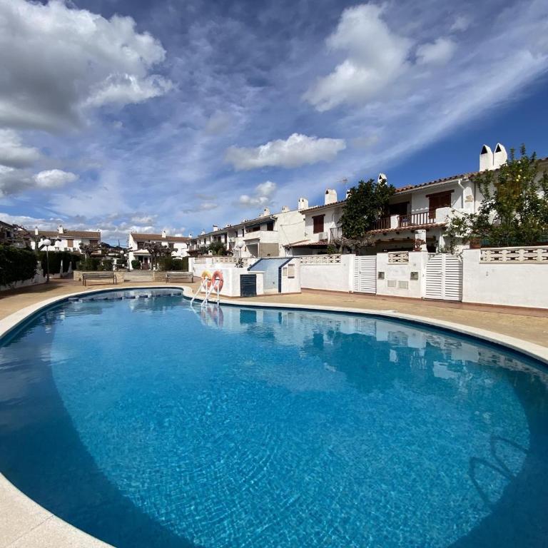 TH31 Casa adosada con piscina y playa al lado - Casa - 1