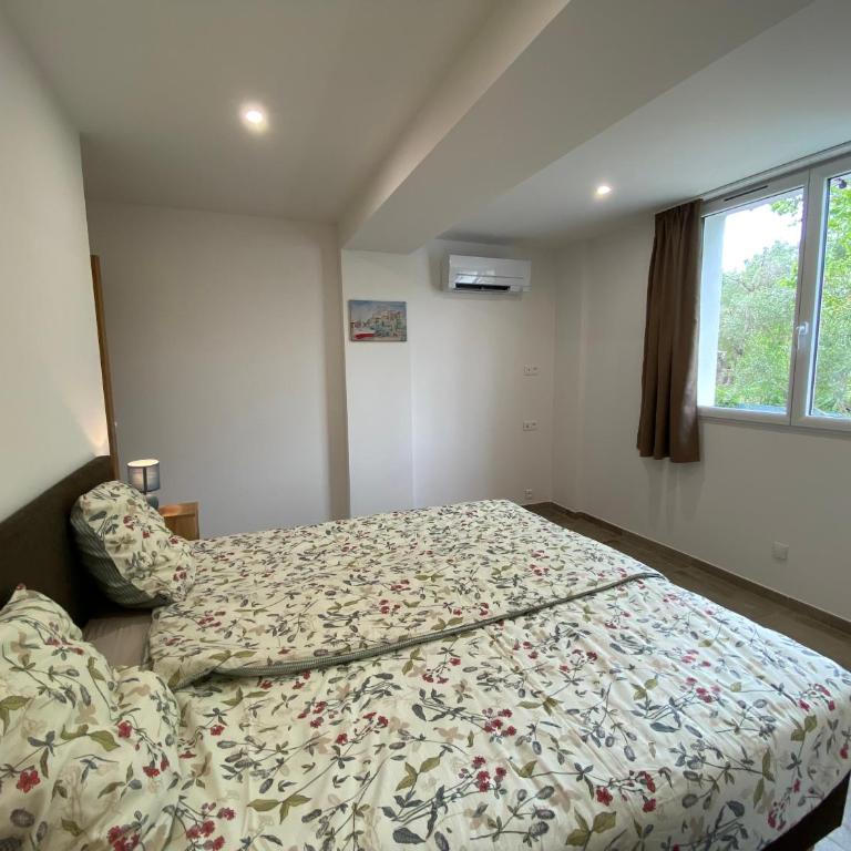 Les Mûriers - Appartement 2 Chambres - Vue sur Jardin - 35