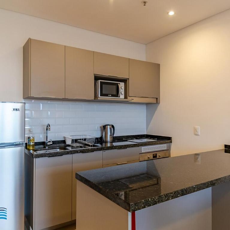 504 Emerald Boutique building just steps away from Shopping del Sol - One-Bedroom Apartment - 10