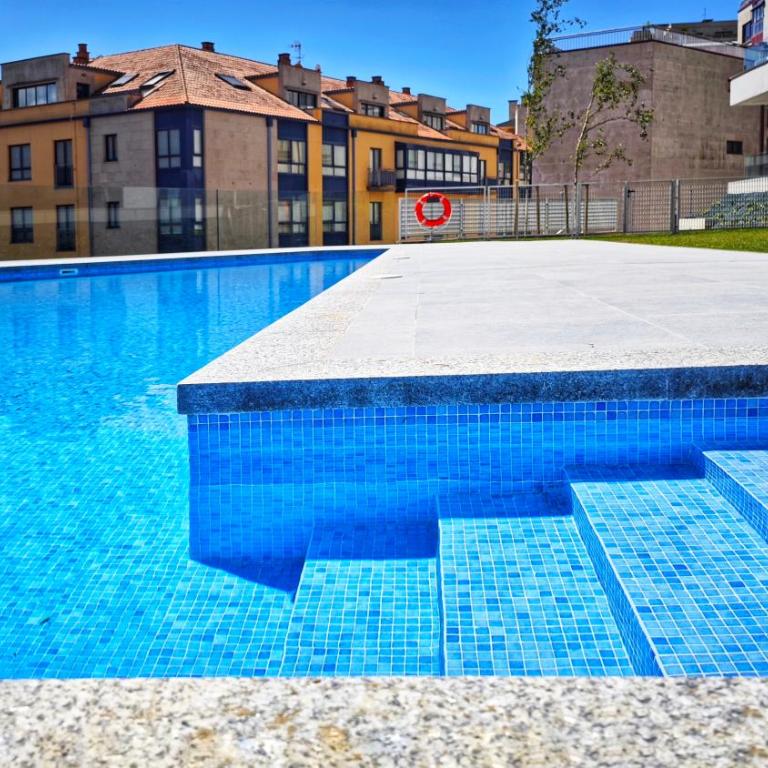 Desconectaengalicia Apartamento Zoo 2 con piscina y vistas al mar a 150 metros de Silgar - Apartamento de 2 dormitorios - 1