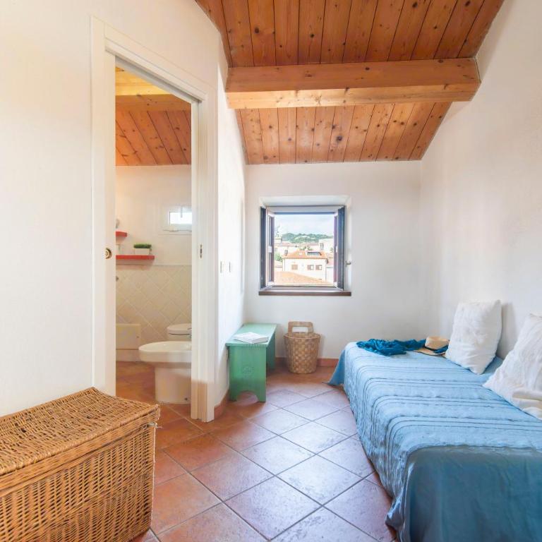 Una Mansarda Nell'isola - Happy Rentals - Monolocale con Balcone - 7