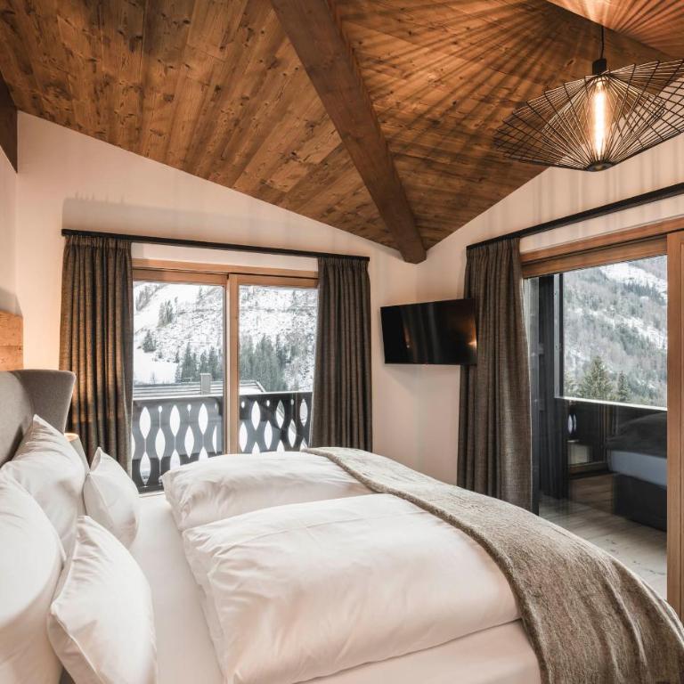 DISTINCTIVE LUXURY DOLOMITI Apartments TERRE71 - Appartamento Deluxe con 3 Camere da Letto - 9