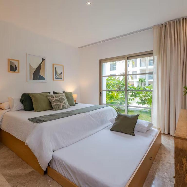 La Amada Residences Private Beach Getaway with Pools & Gym - Three-Bedroom Apartment - 9