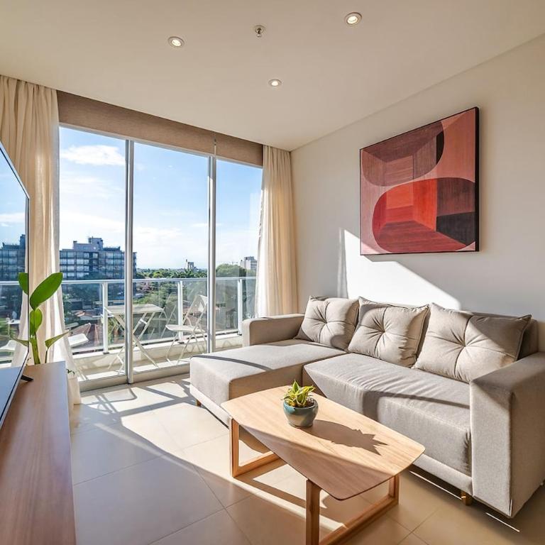 605 Emerald Boutique building just steps away from Shopping del Sol! - Two-Bedroom Apartment - 1
