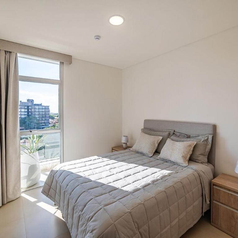 605 Emerald Boutique building just steps away from Shopping del Sol! - Two-Bedroom Apartment - 24