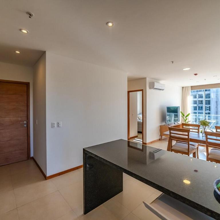 605 Emerald Boutique building just steps away from Shopping del Sol! - Two-Bedroom Apartment - 33